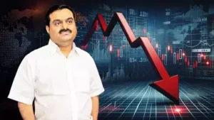 Gautam Adani के शेयरों में गिरावट आई